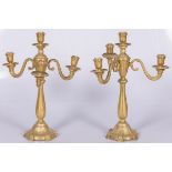 A set of (2) three ligth gilt candlesticks, Charles X-style, 20th century.