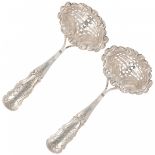 (2) piece set scattering spoons silver.