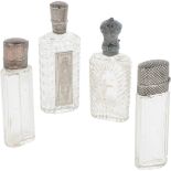 (4) piece lot of perfume bottles silver.