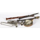 A lot comprising (6) musical instruments, 20th century.