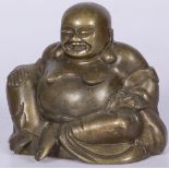 A laughing bronze Buddha, China, 1st half of the 20th century.