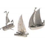 (3) piece lot of miniature sailing boats, silver.