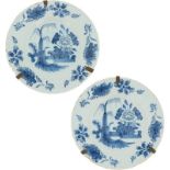 A set of (2) earthenware plates with floral motif, Delft, 18th century.