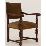 An oakwood armchair, Dutch, late 19th century.