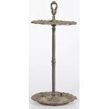 A cast iron umbrella / walking cane stand, circa 1910.