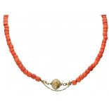 One-row red coral necklace with a gold-plated silver closure - 835/1000.