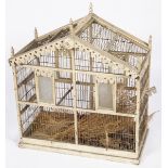 A wooden bird cage, 20th century.