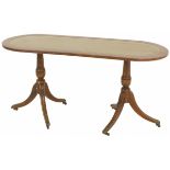 A mahogany oval Regency-style coffeetable, England, 20th century.