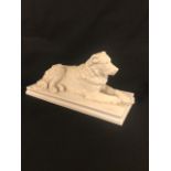 A porcelain desk piece in the shape of a retriever, marked KPM, Germany, 1q. 20th Century.