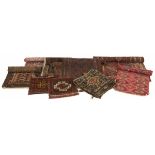 A lot comprised of (10) various carpets and pillowcases, 20th century.