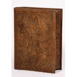 A richly carved Djati-wooden box in the shap of a book, Indonesia, 1st half 20th century.