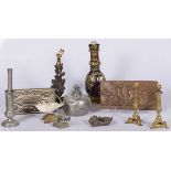 A lot with a.o. a cloisonne table lamp, a ditto ashtray, candle sticks and carvings.