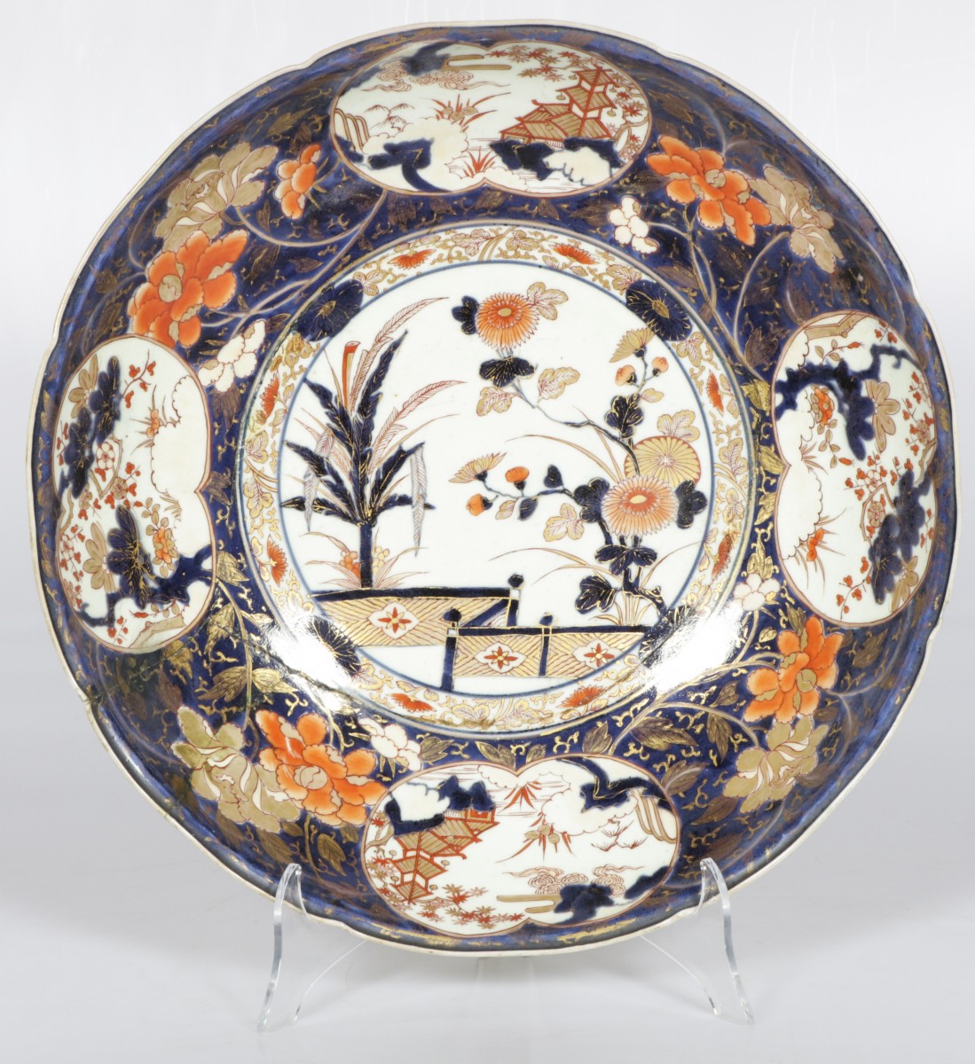 A large Japanese charger with Imari decor.