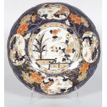 A large Japanese charger with Imari decor.