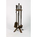 A (4) piece wrought iron chimney-set, 2nd half 20th century.