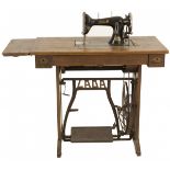 A Lada 77 treadle sewing machine, Tsjechoslovakia, early 20th century.