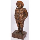 A pinewood sculpture of a fisherman, France, 1st half 20th century.