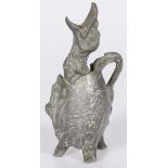 A pewter decorative jug in the shape of a hatching egg, 20th century.
