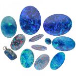 Lot of 11 opal triplets and one lapis lazuli pendant.