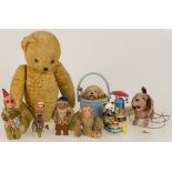 A large lot comprised of various toys a.w. a teddy bear.