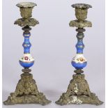 A set of (2) ZAMAC candleholders, porcelain baluster stems, France, late 19th century.