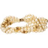 Freshwater cultivated pearl bracelet with an 18 ct. yellow gold closure and spacers.
