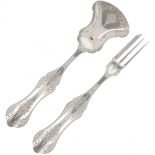 (2) piece ginger silver cutlery.
