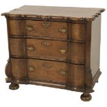 An oakwood three-drawer commode, Dutch, 2nd half 18th century.