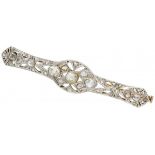 14K. White gold openwork Art Deco brooch set with rose cut diamond.