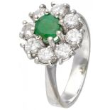 18K. White gold rosette ring set with approx. 0.80 ct. diamond and approx. 0.39 ct. natural emerald.