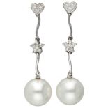 14K. White gold earrings set with approx. 0.17 ct. diamonds and freshwater pearls.