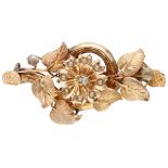 14K. Rose gold flower-shaped brooch set with seed pearls and a rhinestone.