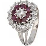 14K. White gold target ring set with approx. 0.48 ct. diamond and approx. 1.12 ct. natural ruby.