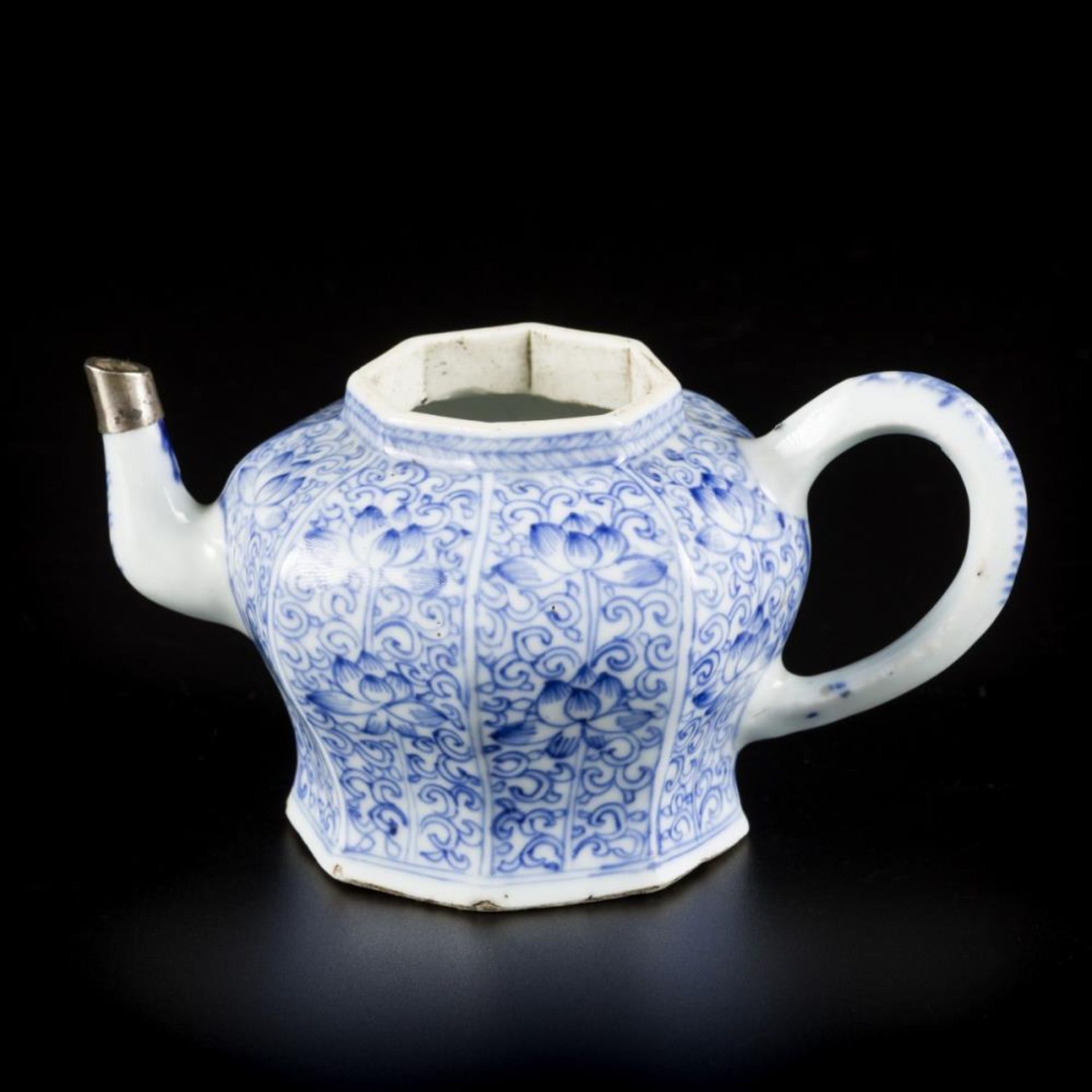 A porcelain teapot with floral decoration in compartments, China, Kangxi.