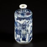 A porcelain iron-red snuff bottle decorated with street artists, China, 19th century.
