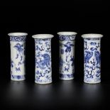 A lot of (4) porcelain vases with decor of foo-dogs and playing figures. China, 19th century.