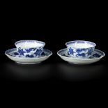 A set of (2) porcelain cups and saucers with floral decorations, China, Kangxi/Yongzheng.