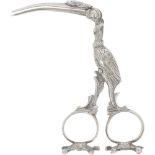 Diaper pliers (also called umbilical pliers) in the shape of a stork standing on turtles, silver.
