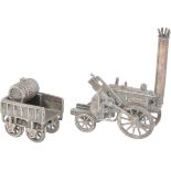 Miniature steam train with trailer silver.