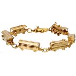 18K. Yellow gold bracelet with locomotive and 5 wagons.