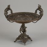 A cast bronze tazza decorated with bronze dragons and resting mythological figures on feet in the sh