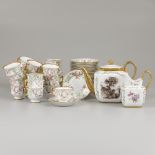 A (26) piece porcelain service with floral decor. France, 19th century.