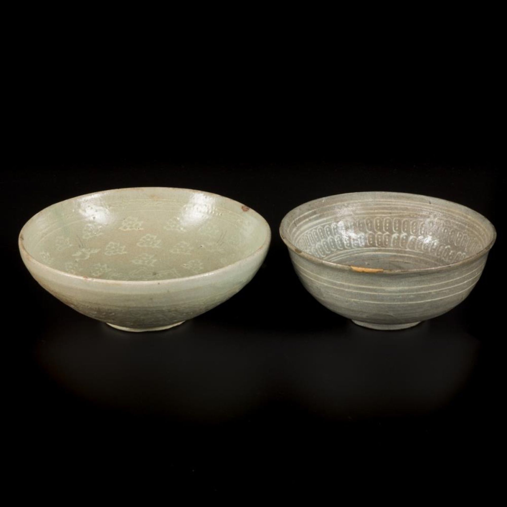 A lot comprised of (2) glazed earthenware bowls, Korea, 13th century.