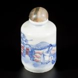 A porcelain underglaze red snuff bottle with various figures in a landscape, China, 19th century.