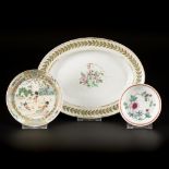 A lot comprised of various porcelain a.w. 2 plates and a serving dish, all with floral decoration, C