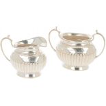 (2) piece cream set silver.