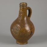 A bartmann/ 'Bartmann' stoneware jug with tiger salt glaze, (Cologne/ Frechen), Germany, late 17th c