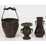 A lot of miscellaneous bronze objects including a koro and a handle basket. China, 20th century.