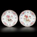 A set of (2) porcelain famille rose plates with birds on leaf decor, China, 18th century.