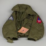 A flight jacket / bomber jacket, Black Lions, F14 Tomcat, together with a flight line note book.